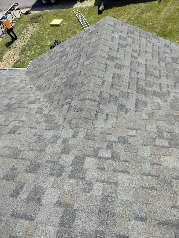 Slide of WM Siding and Roofing