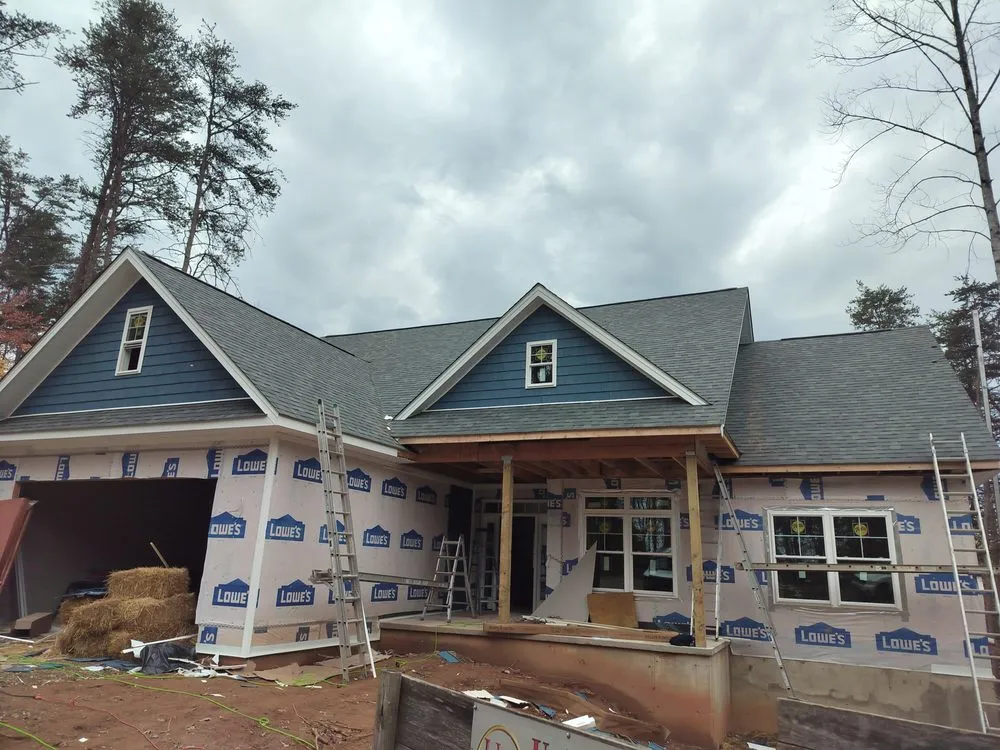 Slide of WM Siding and Roofing