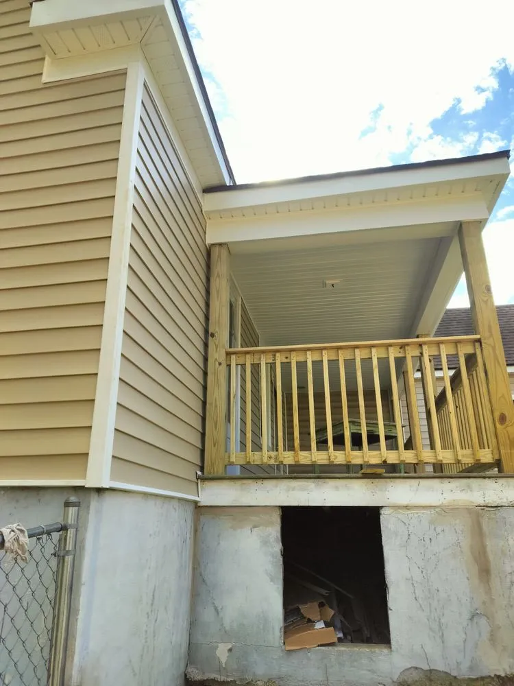 Slide of WM Siding and Roofing