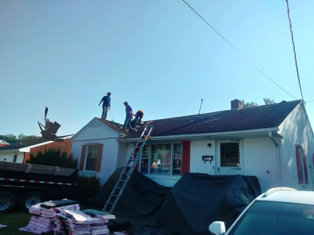 Slide of WM Siding and Roofing