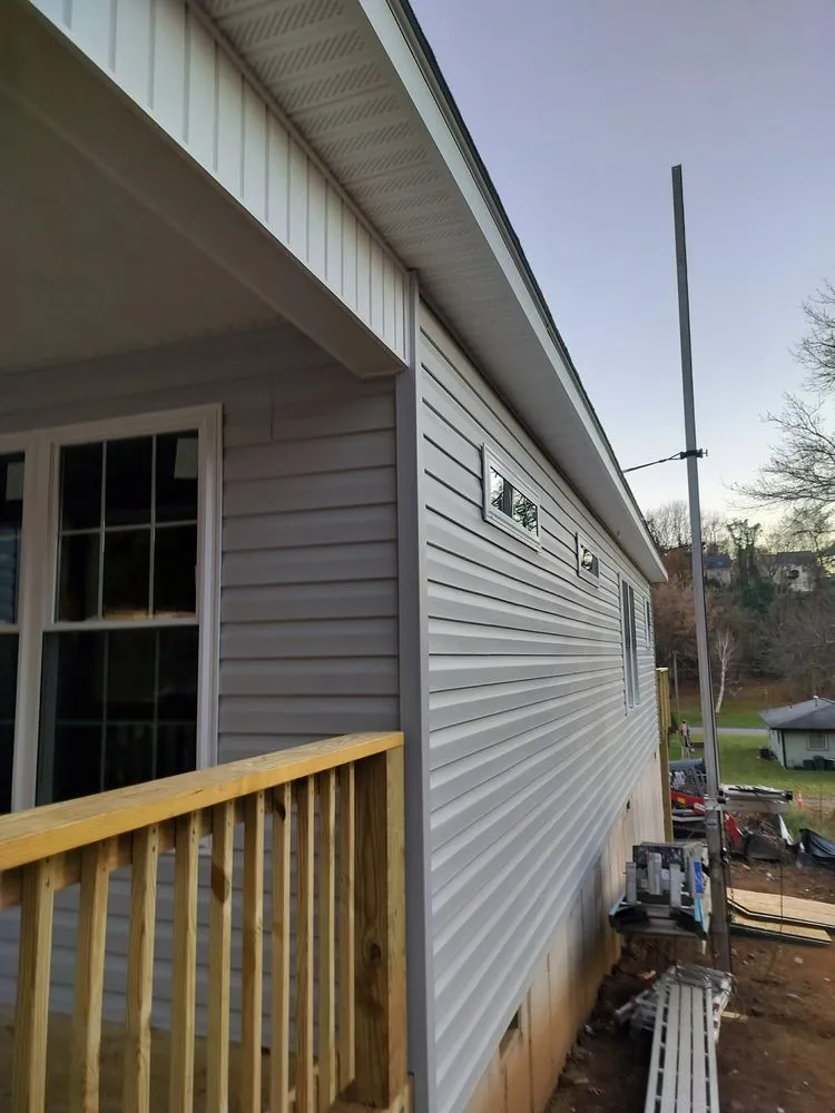 Slide of WM Siding and Roofing