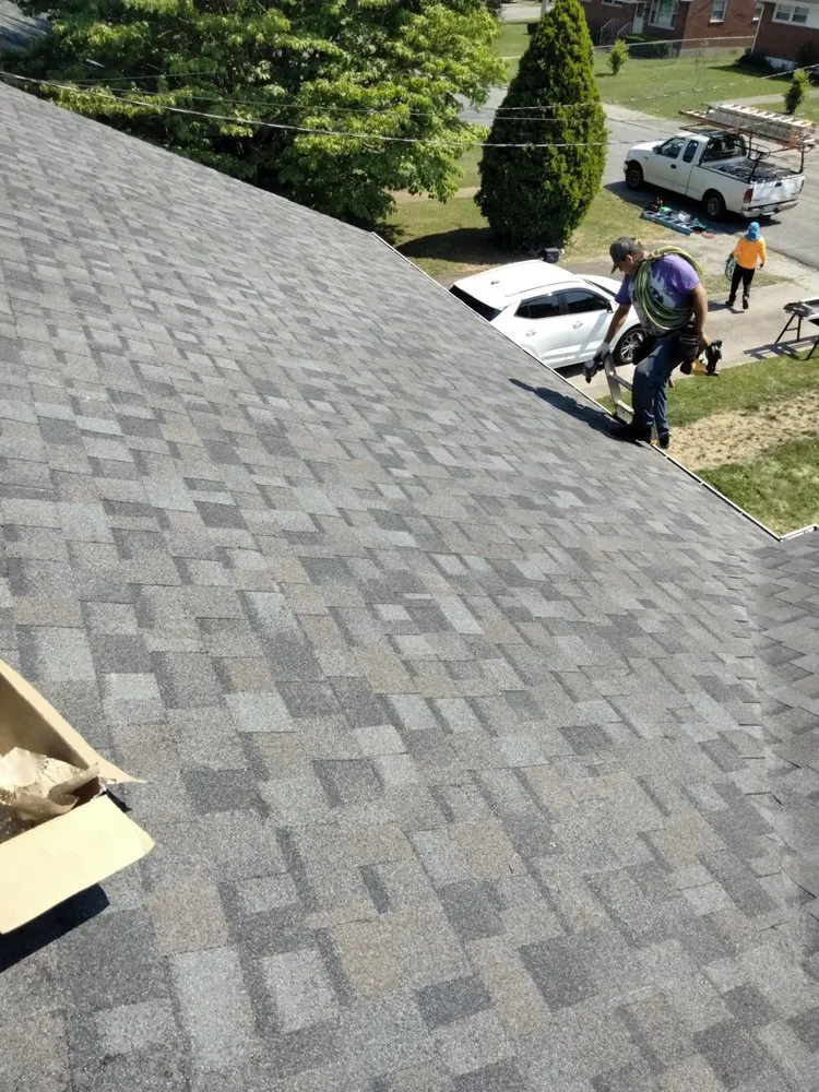 Slide of WM Siding and Roofing