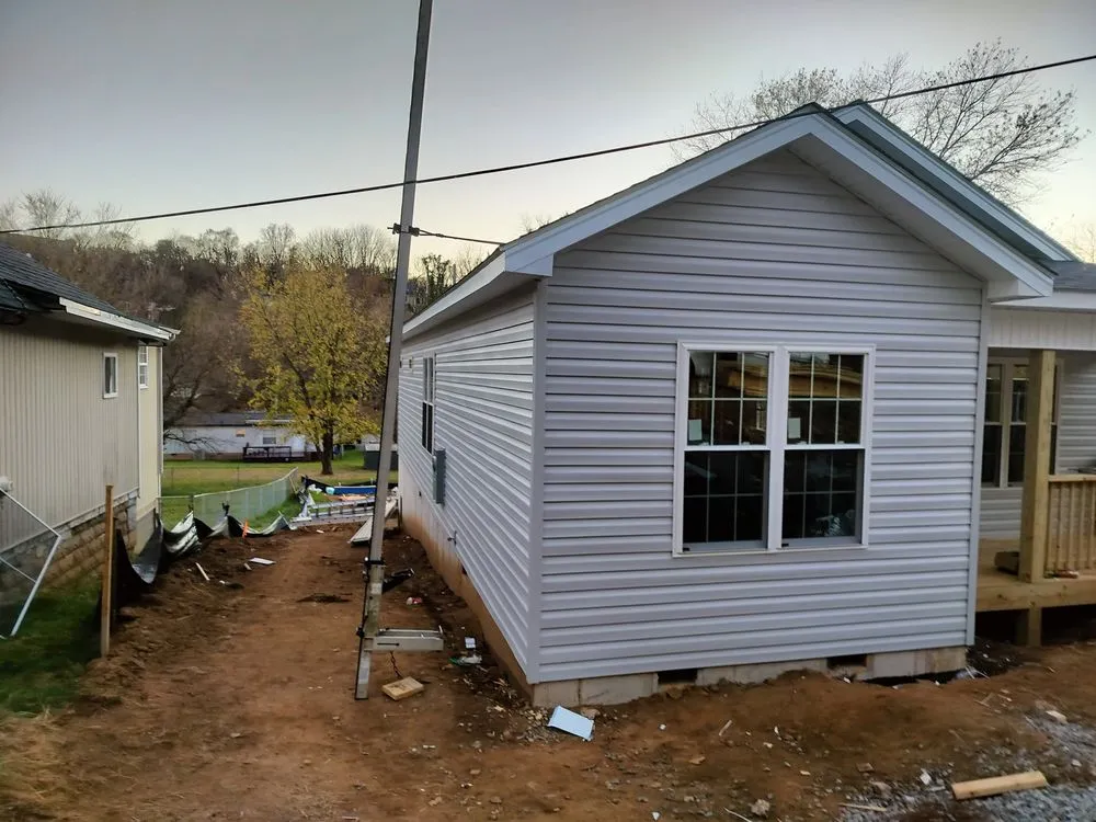 Slide of WM Siding and Roofing