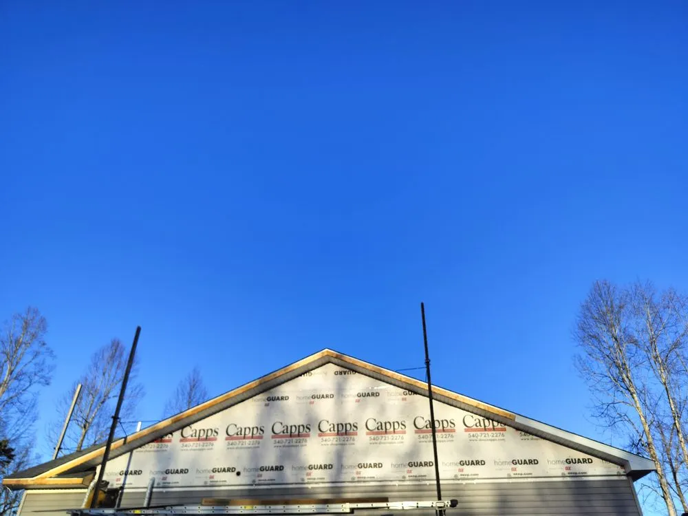 Slide of WM Siding and Roofing