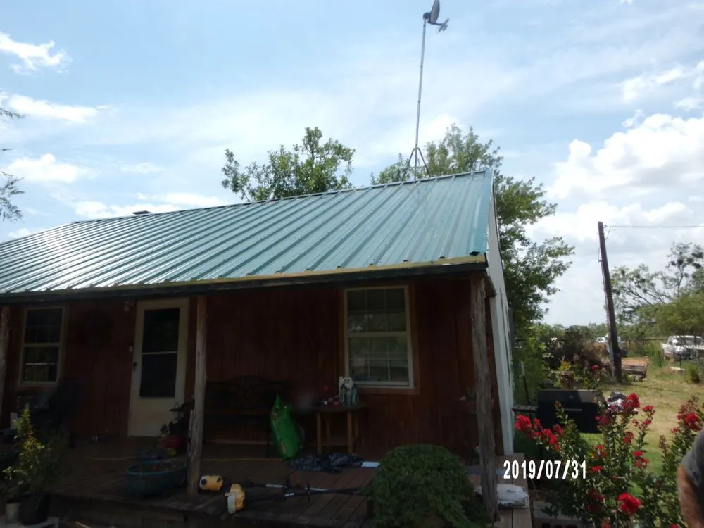 Slide of Wolf Roofing and General Contracting