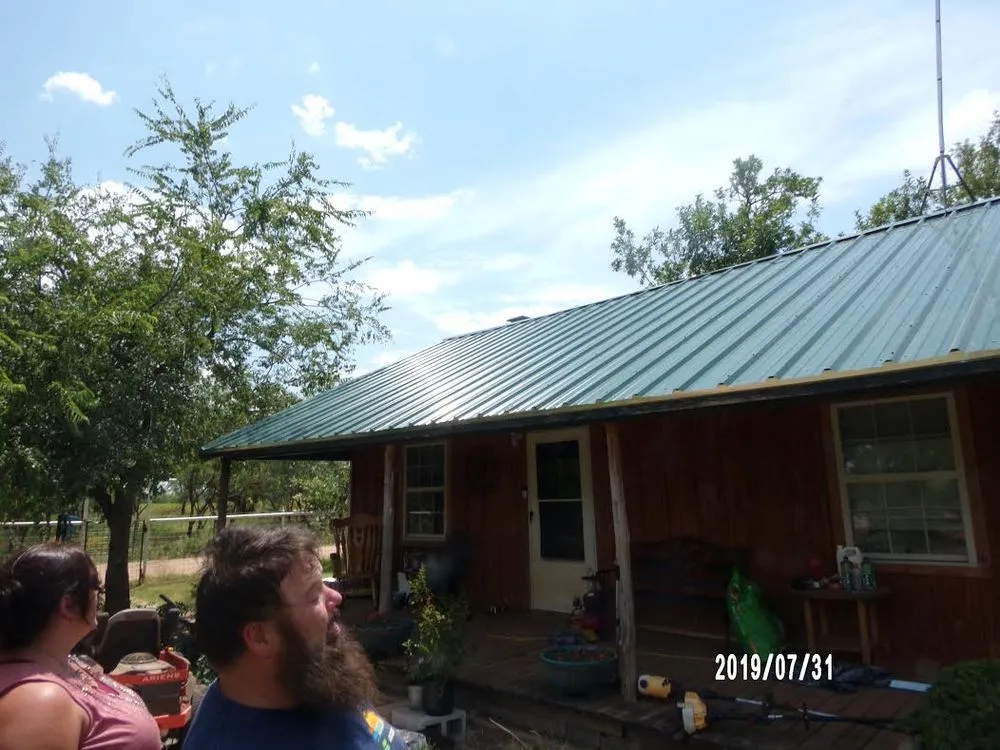 Slide of Wolf Roofing and General Contracting