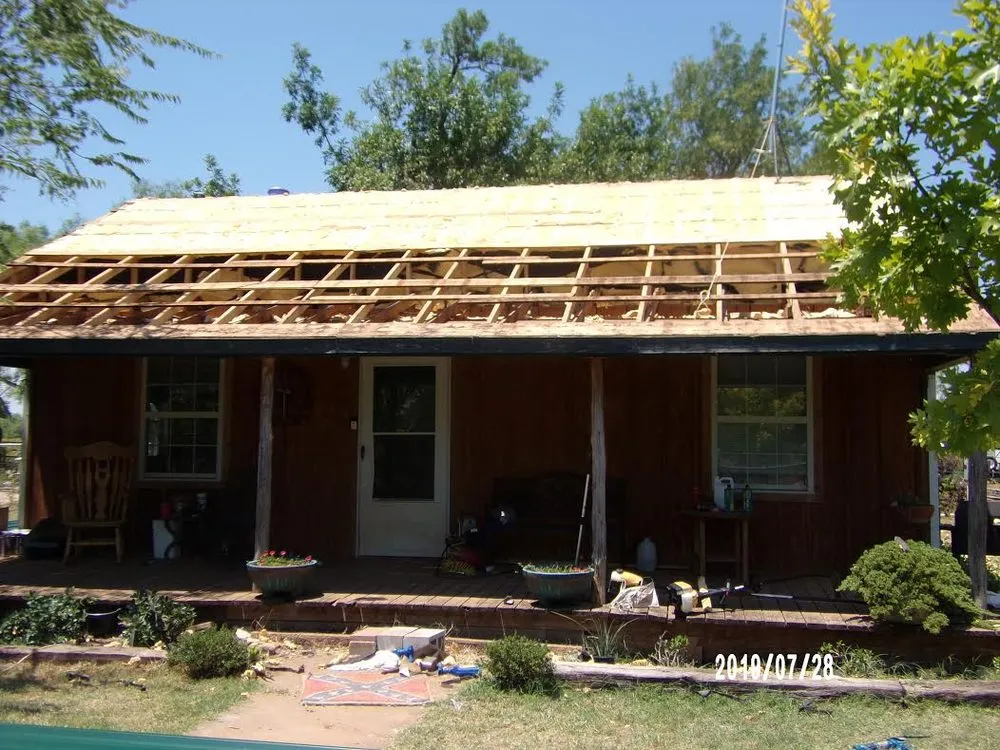 Slide of Wolf Roofing and General Contracting