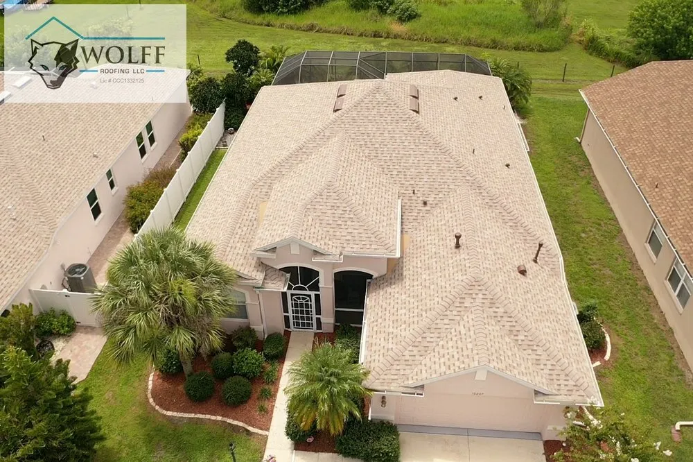 Slide of Wolff Roofing