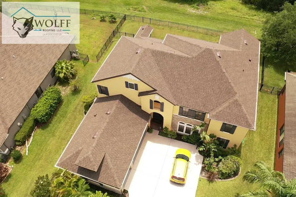 Slide of Wolff Roofing