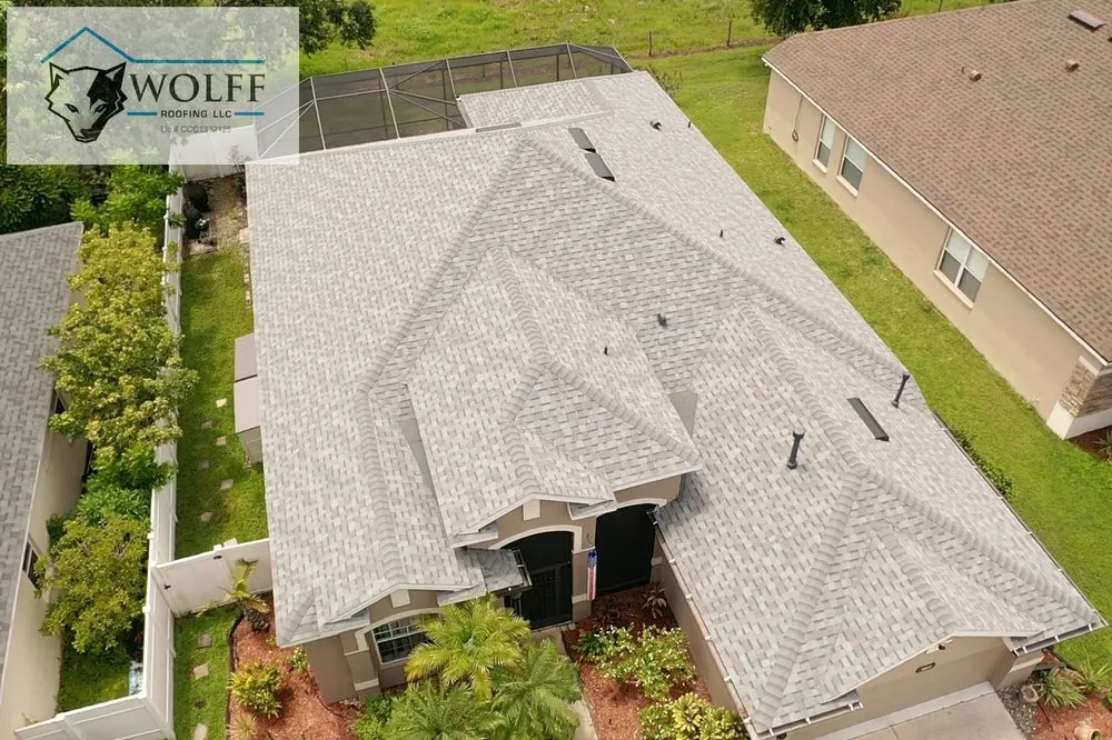 Slide of Wolff Roofing