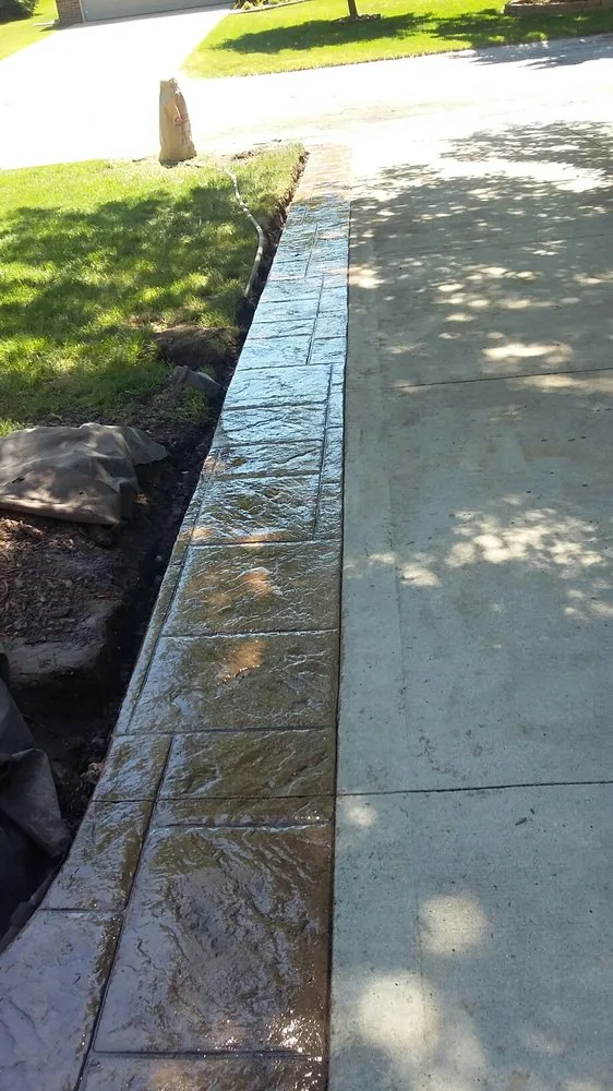Local roof leak repair with free inspection in Dryden, MI by Wolverine Cement Construction