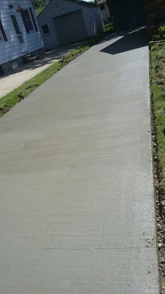 Local storm damage roof repair experts serving Dryden, MI - Wolverine Cement Construction