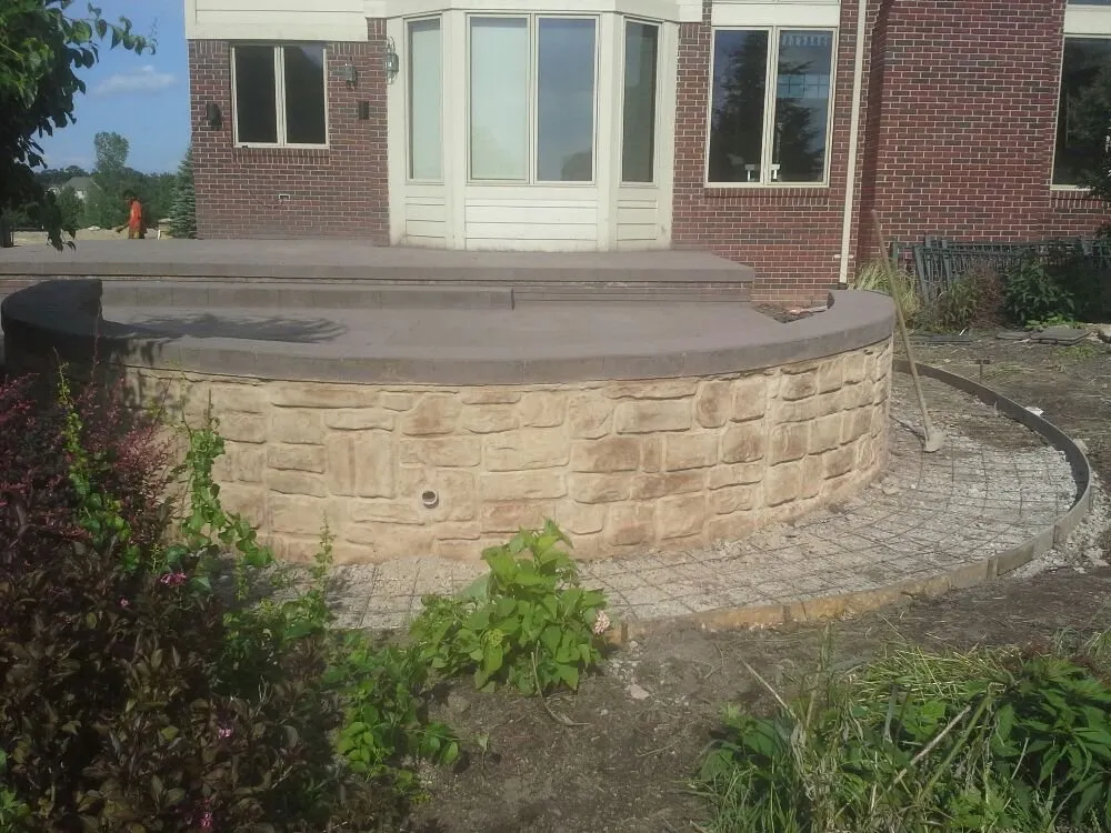 Top-rated residential roofing service same-day service in Dryden, MI by Wolverine Cement Construction
