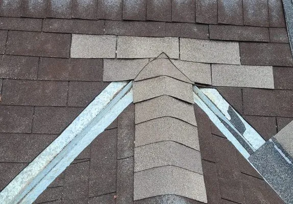 Womack's Roof Repairs Logo