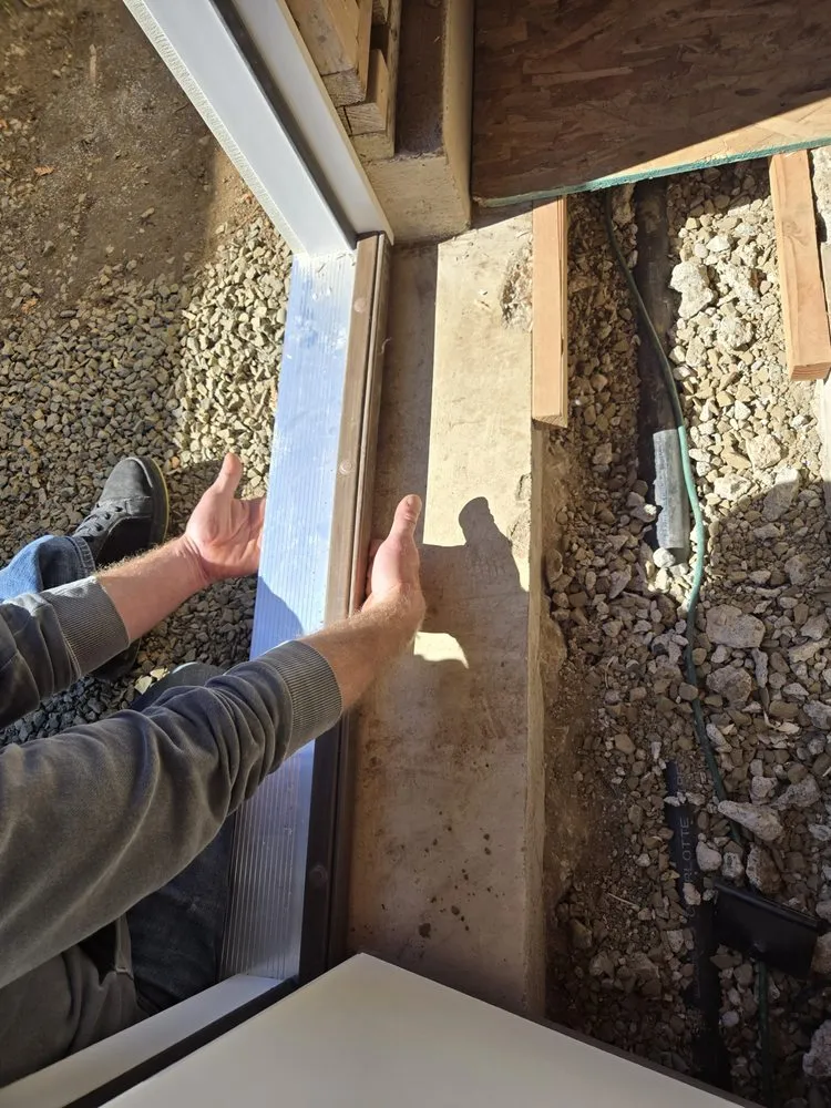 Slide of Woodpecker Roofing & Remodel