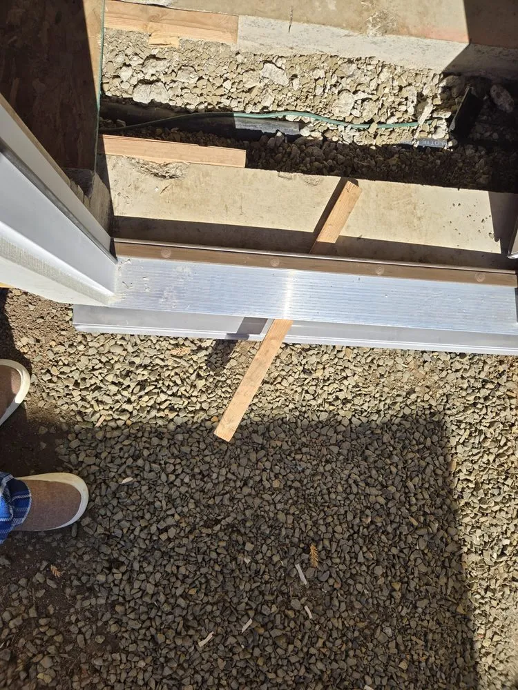 Slide of Woodpecker Roofing & Remodel