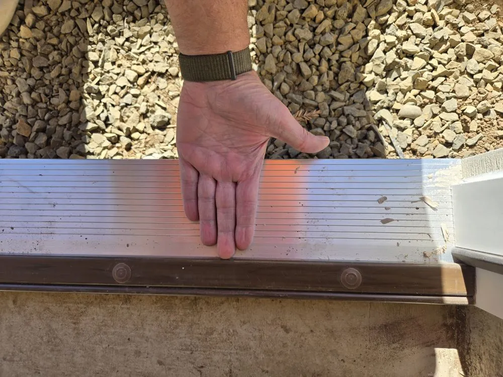 Slide of Woodpecker Roofing & Remodel