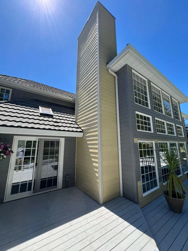 Slide of Woodpecker Roofing & Remodel