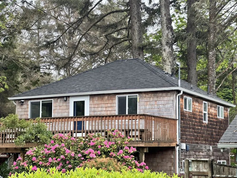 Slide of Woodpecker Roofing & Remodel