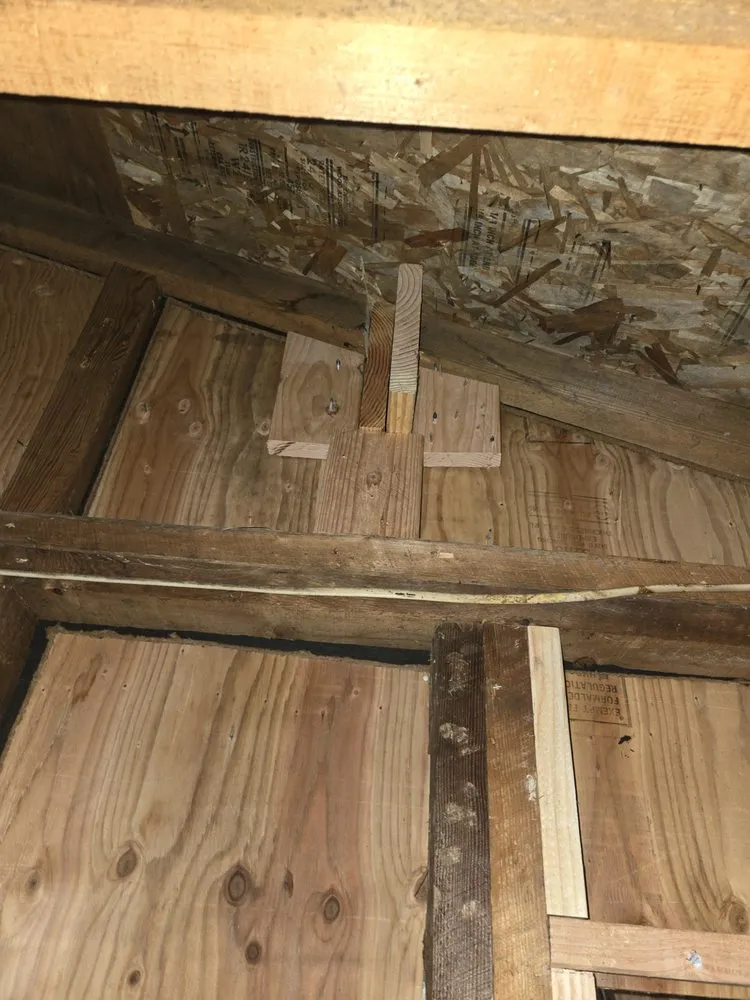 Slide of Woodpecker Roofing & Remodel