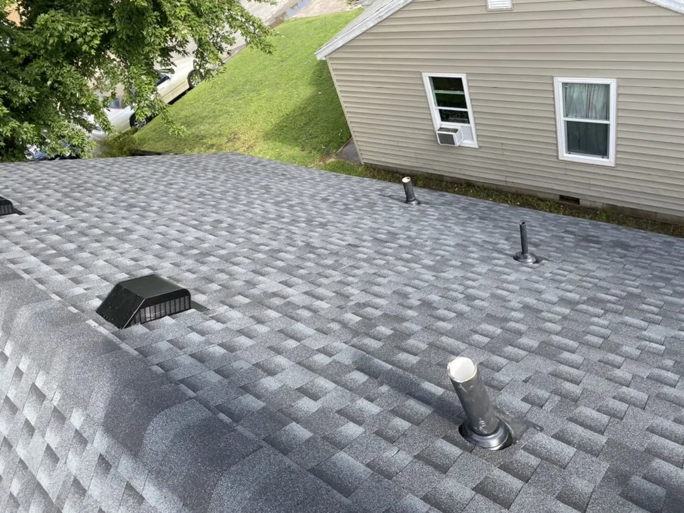 Slide of Woodpecker Roofing And Guttering