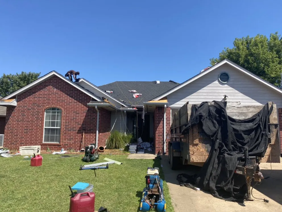 Slide of Woodpecker Roofing And Guttering