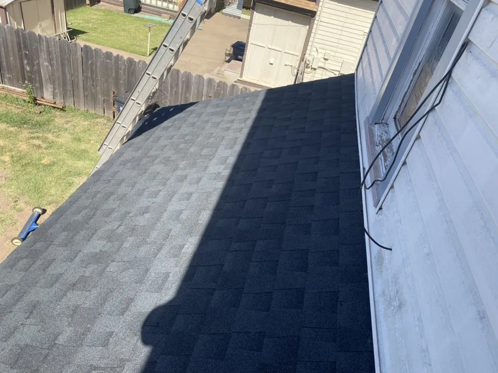 Slide of Woodpecker Roofing And Guttering