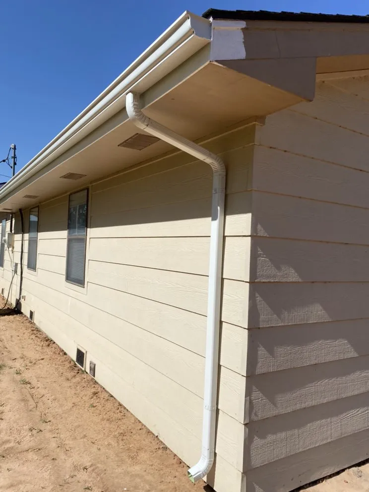 Slide of Woodpecker Roofing And Guttering