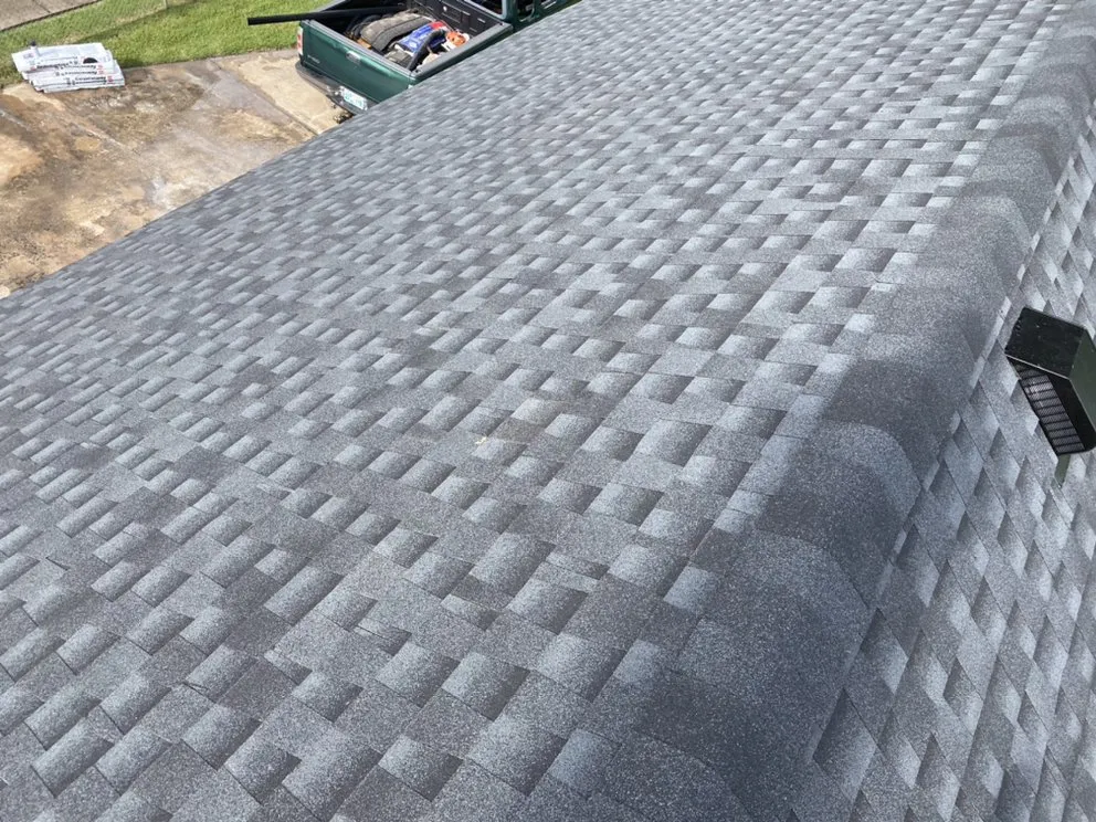 Slide of Woodpecker Roofing And Guttering