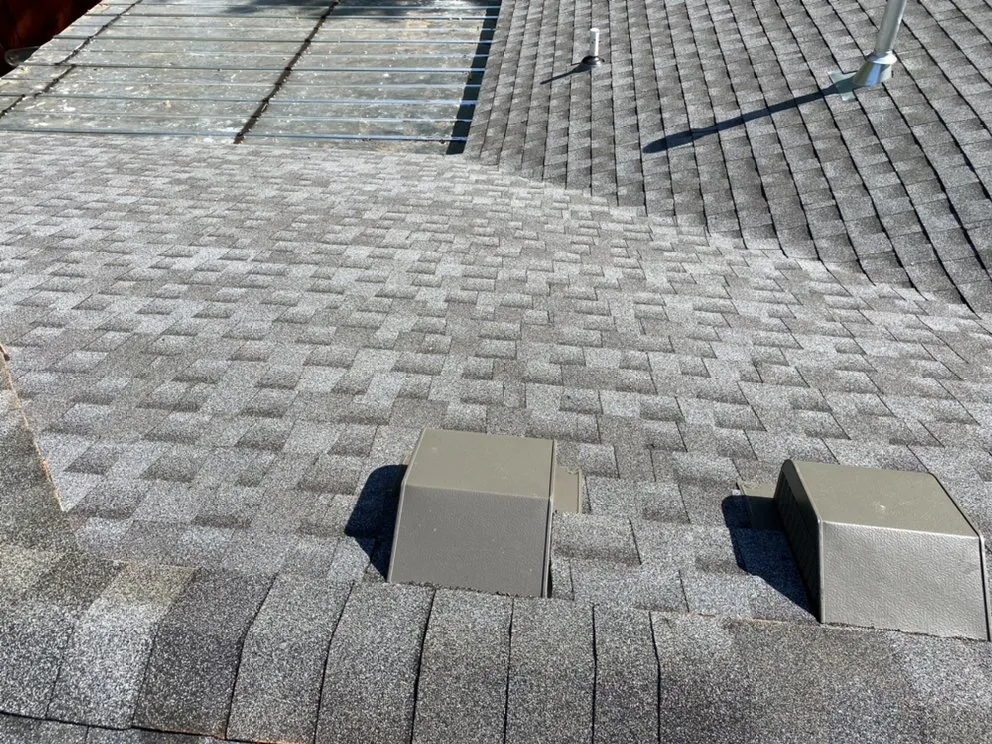 Slide of Woodpecker Roofing And Guttering