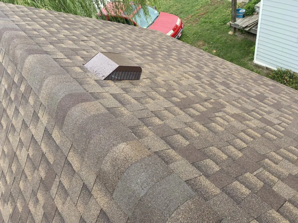 Slide of Woodpecker Roofing And Guttering