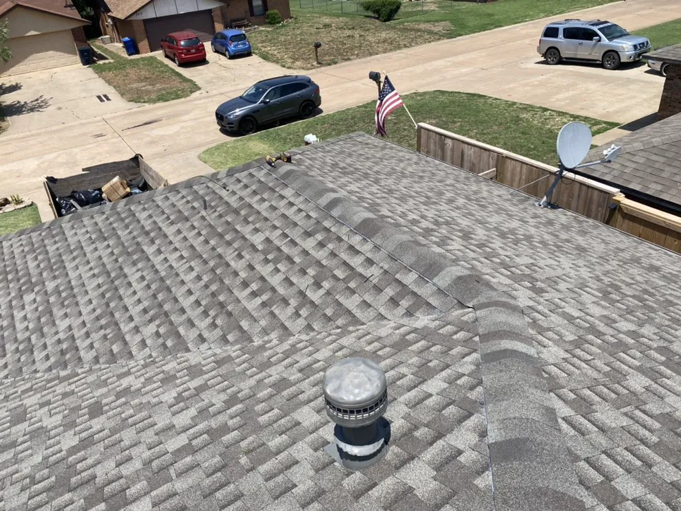 Slide of Woodpecker Roofing And Guttering