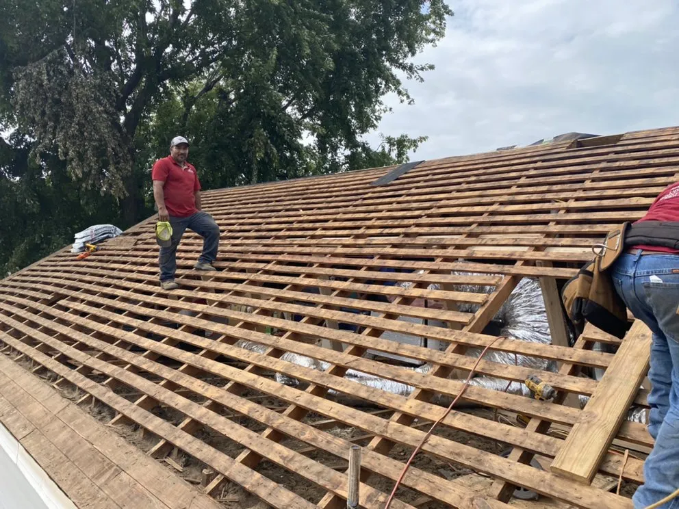 Slide of Woodpecker Roofing And Guttering