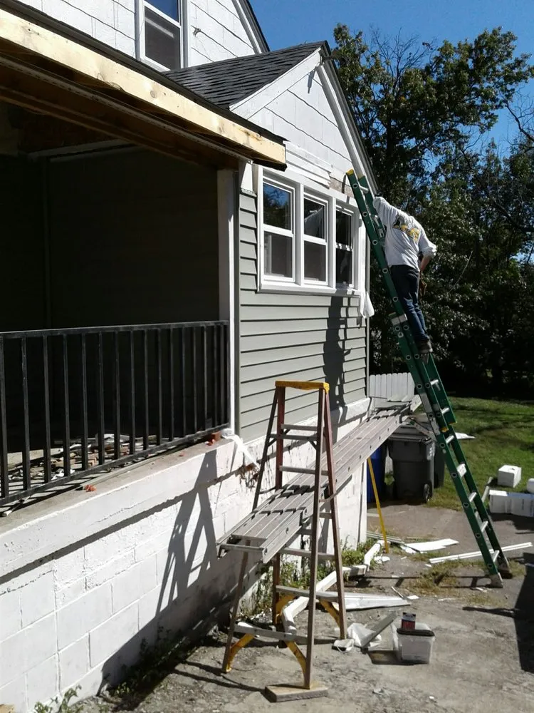 Slide of Woodrum's Guttering & Home Improvement's