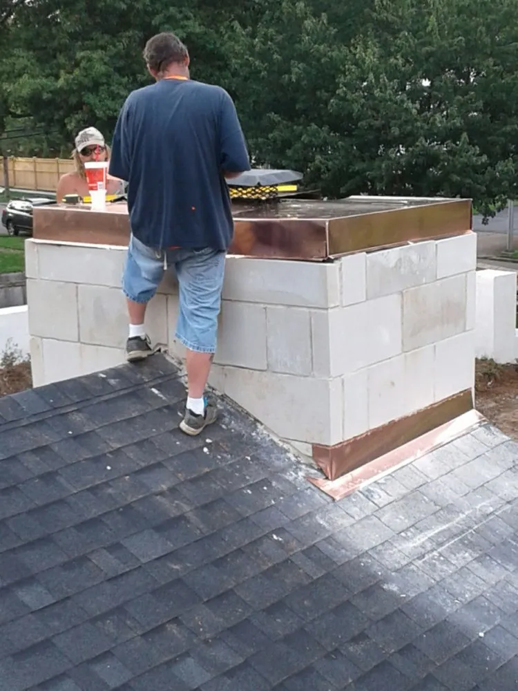 Slide of Woodrum's Guttering & Home Improvement's