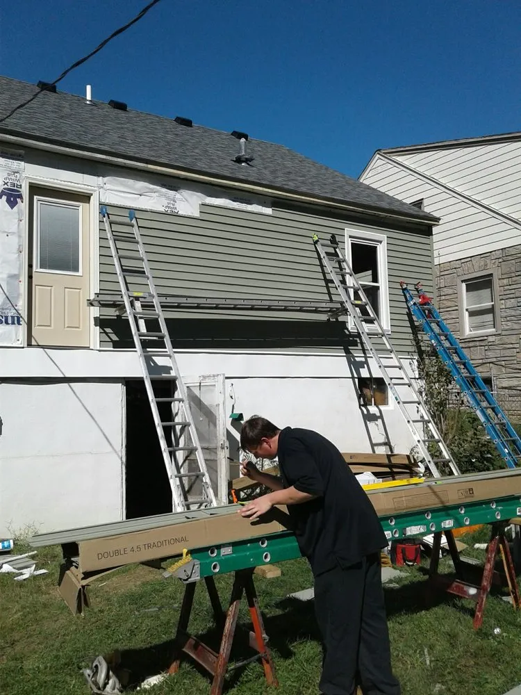 Slide of Woodrum's Guttering & Home Improvement's