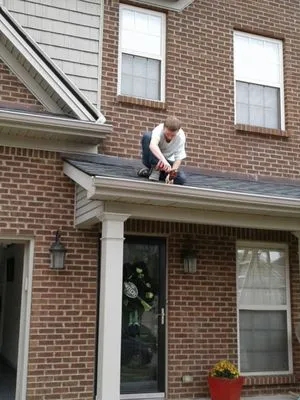 Woodrum's Guttering & Home Improvement's Logo