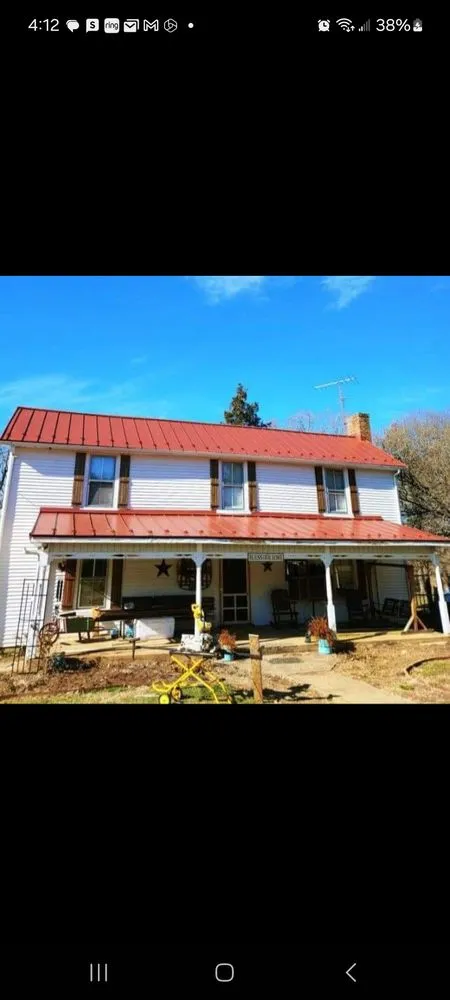 Licensed storm damage roof repair near you in Evington, VA by Woods Handyman Service