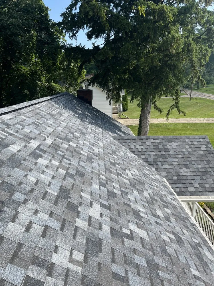 Slide of WOODS Roofing & Exteriors