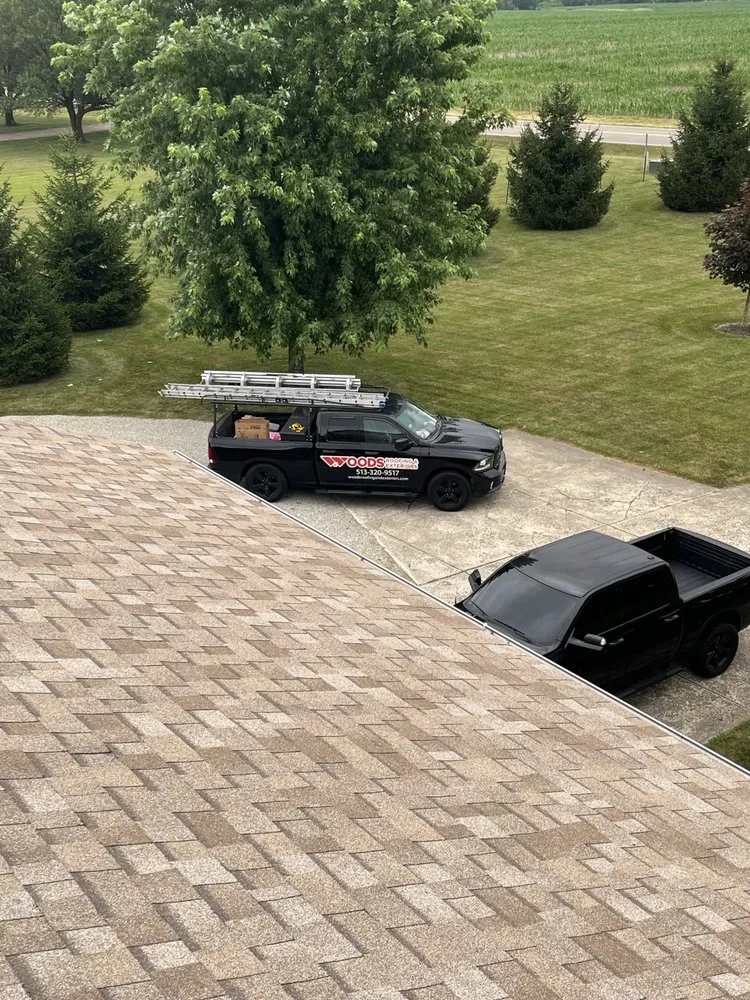 Slide of WOODS Roofing & Exteriors