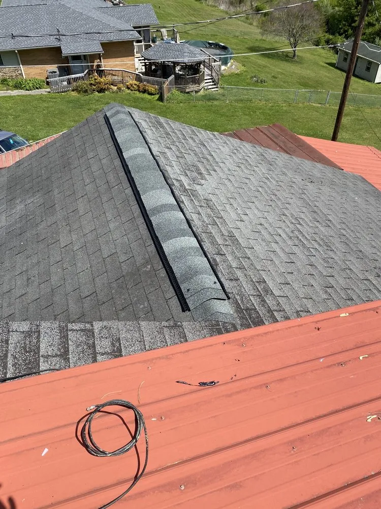 Slide of Woods Roofing & Repairs