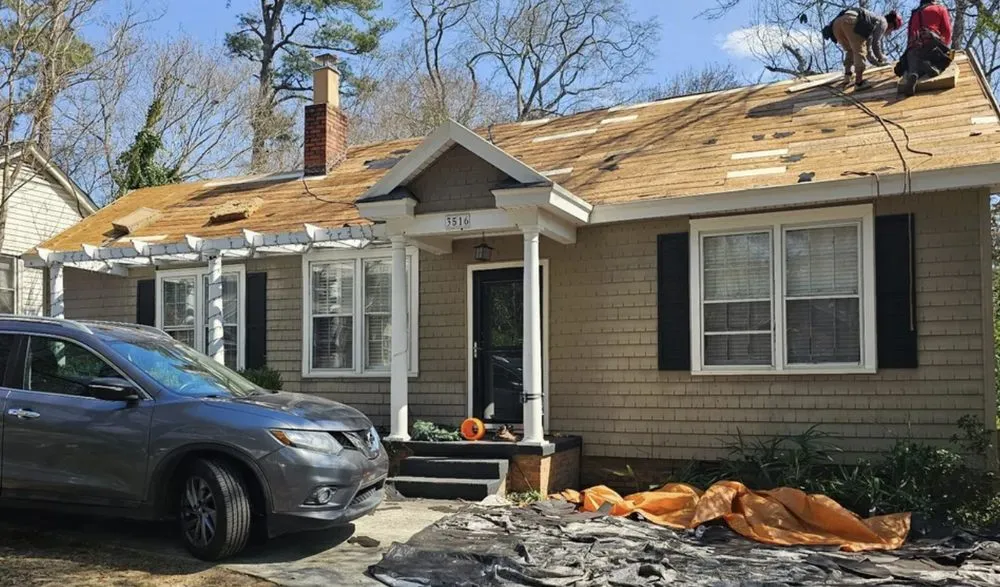 Slide of Woods Roofing and Remodeling