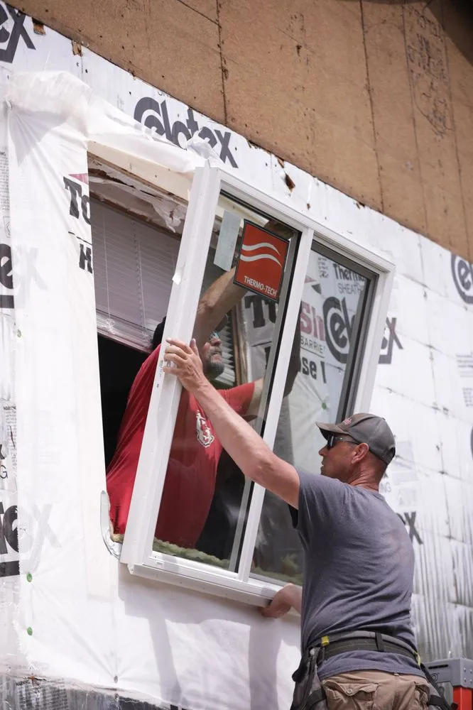 Slide of Woods Roofing