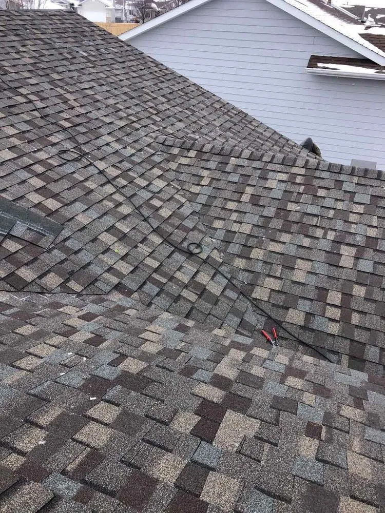 Slide of Woods Roofing