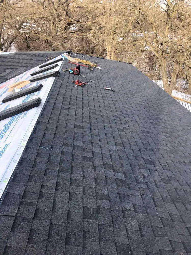 Slide of Woods Roofing