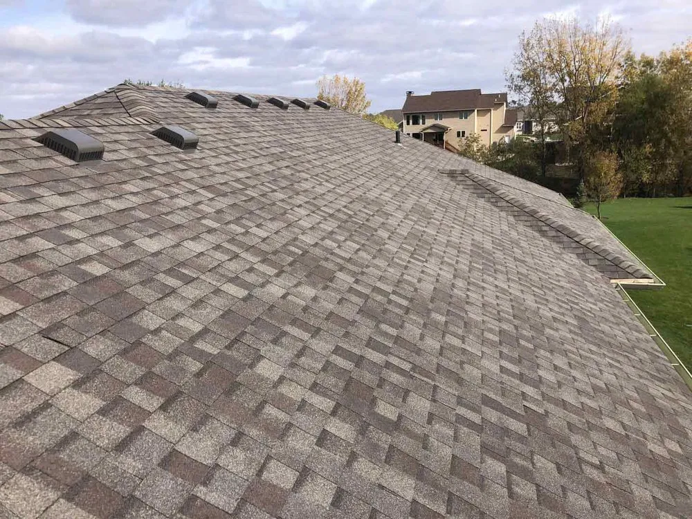 Slide of Woods Roofing