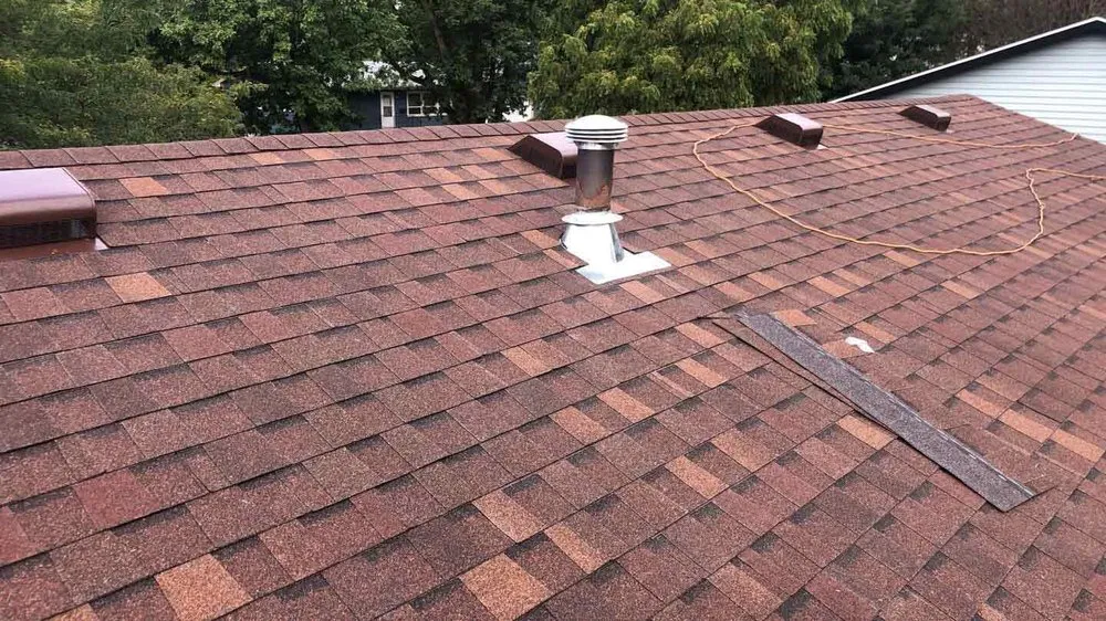 Slide of Woods Roofing