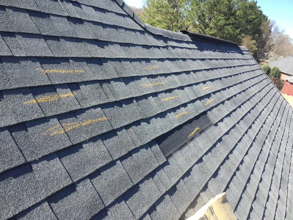 Slide of Woodward Roofing