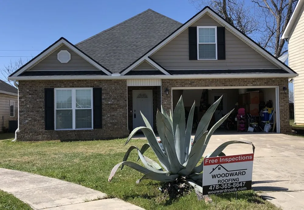 Slide of Woodward Roofing