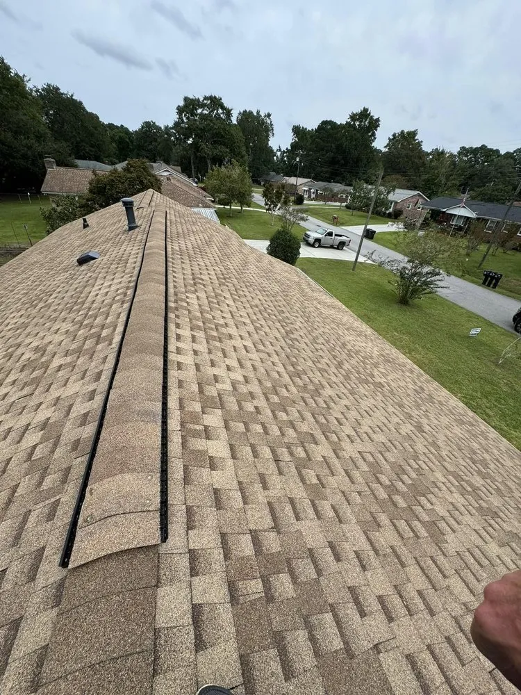 Slide of Woody's Roofing